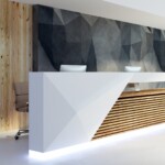 Side view of illuminated reception desk in clean office interior. Lobby and waiting area concept. 3D Rendering