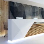 Side view of illuminated reception desk in clean office interior. Lobby and waiting area concept. 3D Rendering